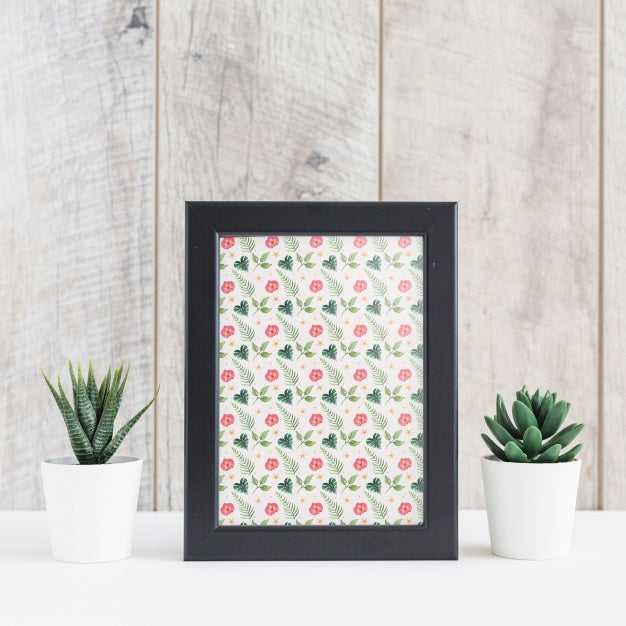 Frame Mockup Next To Plants Psd