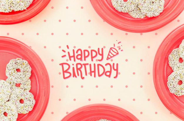 Frame Of Plates With Cookies On Table Psd