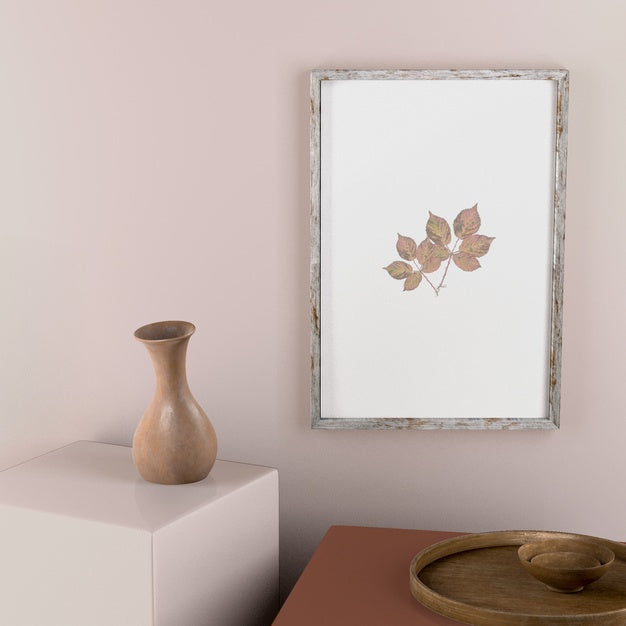 Frame On Wall With Leaves And Vase Decor Psd