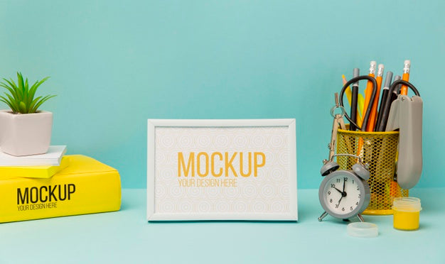 Frame Surrounded By Pencils And Alarm Clock With Mock-Up Psd