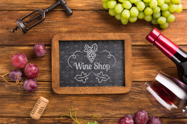 Frame With Grapes And Wine Bottle Psd