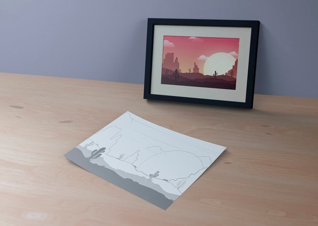 Frame With Landscape And Sketch On Sheet Beside Psd