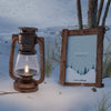 Frame With Winter Theme Beside Lantern Psd