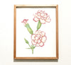 Framed Painting Of Flowers On A Wall
