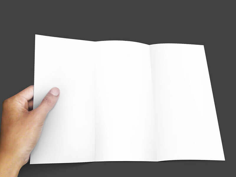 Trifold Brochure Mockup in a Hand