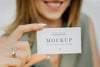 Friendly Woman Carrying A Business Card Mockup Psd