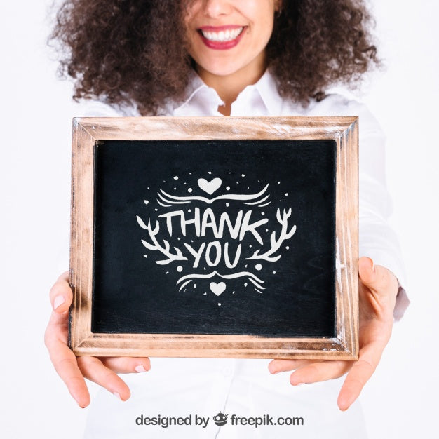 Friendly Woman Presenting Slate Psd