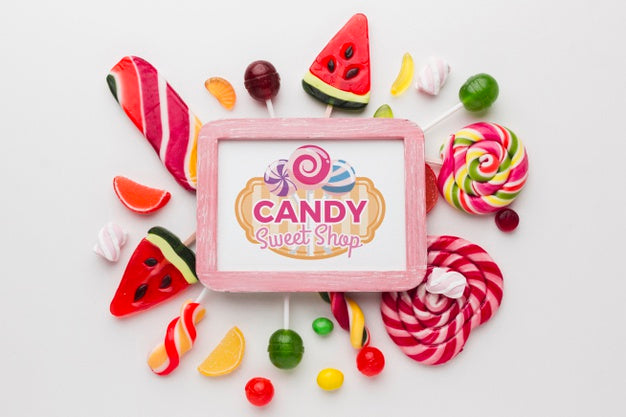 Frmael With Tasty Lollipops On Table Psd