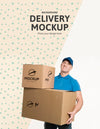 Front View Delivery Man Holding A Bunch Of Boxes With Background Mock-Up Psd
