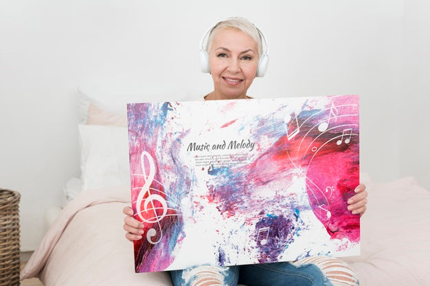 Front View Elderly Woman Holding A Mock-Up Banner Psd