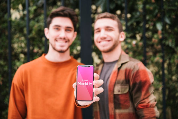 Front View Guys Holding Up Smartphone Psd