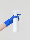 Front View Hand Holding Disinfection Bottle Mock-Up Psd