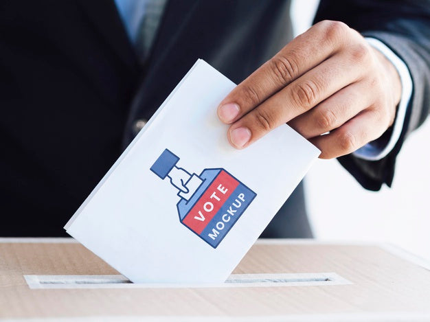 Front View Male Putting Ballot Mock-Up In Box Psd