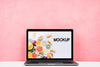 Front View Mock-Up Laptop With Pink Background Psd