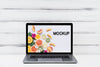 Front View Mock-Up Laptop With Wooden Background Psd