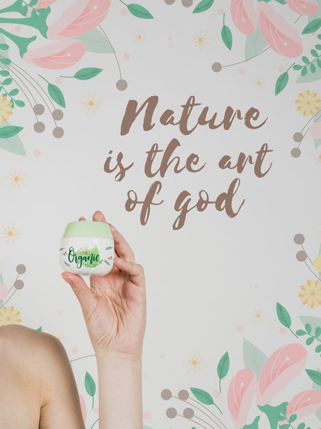 Front View Of A Hand Holding A Cream Bottle Psd