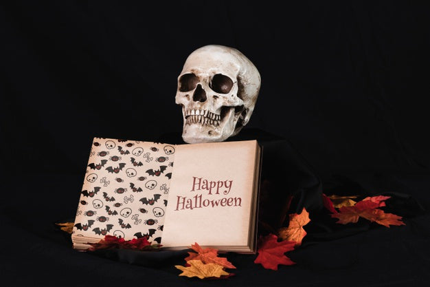 Front View Of A Skull With A Book Psd