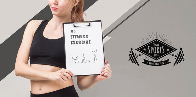 Front View Of Athletic Woman Holding Notepad Psd