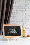 Front View Of Blackboard With Wine Bottle Psd