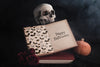 Front View Of Book And Skull With Black Background Psd