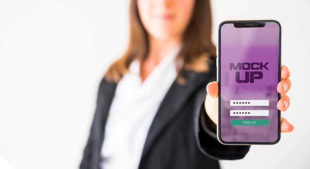 Front View Of Businesswoman Holding Smartphone Psd