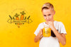 Front View Of Child Drinking Juice From Jar Psd