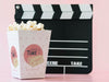 Front View Of Cinema Clapperboard And Popcorn Psd