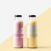 Front View Of Clear Juice Bottles Psd