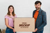 Front View Of Couple Holding Moving Box Mock-Up Psd