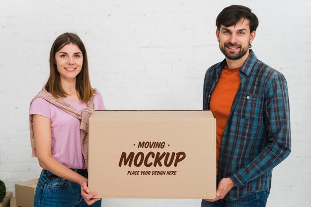 Front View Of Couple Holding Moving Box Mock-Up Psd