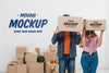 Front View Of Couple Posing With Moving Boxes Mock-Up Psd