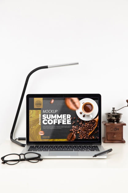 Front View Of Desk Surface With Laptop And Glasses Psd