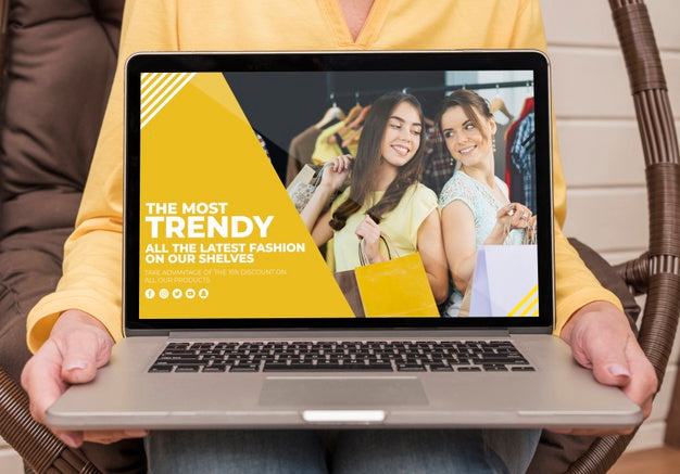 Front View Of Elder Woman Holding Laptop Psd