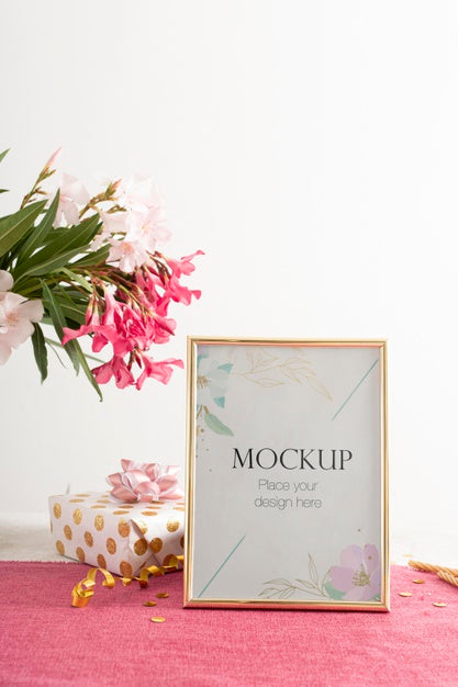 Front View Of Elegant Birthday Frame With Present And Flowers Psd