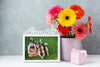 Front View Of Flowers On With Frame On Table Psd