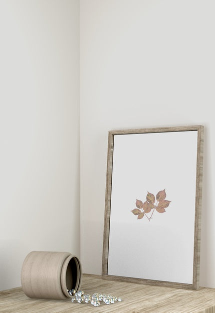 Front View Of Frame Decor With Vase On Surface Psd