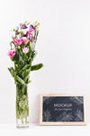 Front View Of Frame Mock-Up With Vase Of Flowers Psd