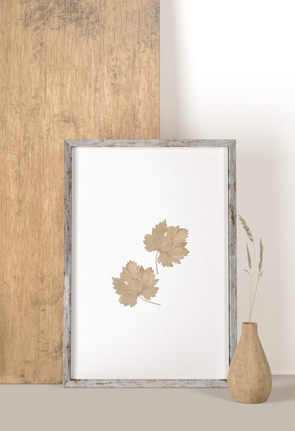 Front View Of Frame With Leaves And Vase With Flower Psd