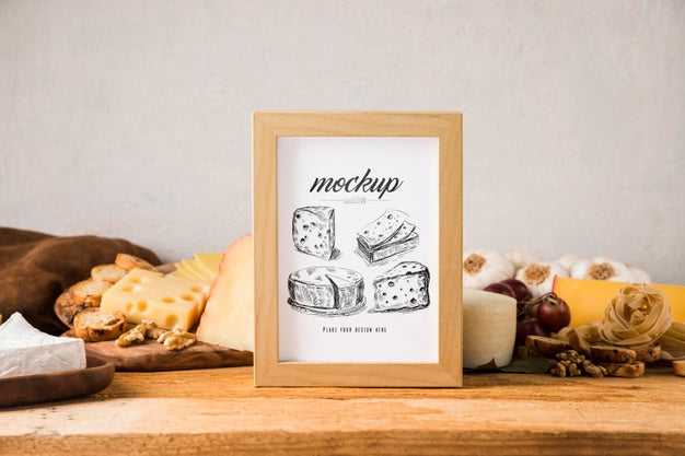 Front View Of Frame With Variety Of Cheese And Grapes Psd