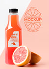 Front View Of Grapefruit Juice Glass Bottle With Cap Psd