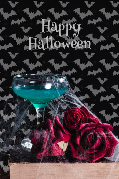 Front View Of Halloween Concept With Flowers And Books Psd