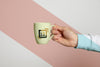 Front View Of Hand Held Mug Psd
