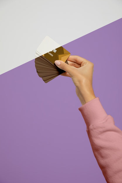 Front View Of Hand Holding Business Cards Psd