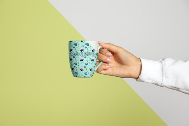 Front View Of Hand Holding Mug Psd