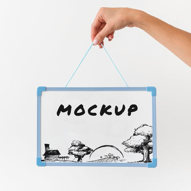 Front View Of Hand Holding Up Whiteboard Psd