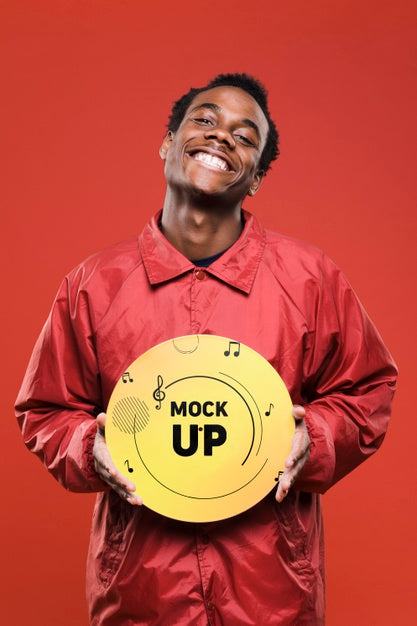 Front View Of Happy Man Holding Vinyl Disk For Music Store Mock-Up Psd