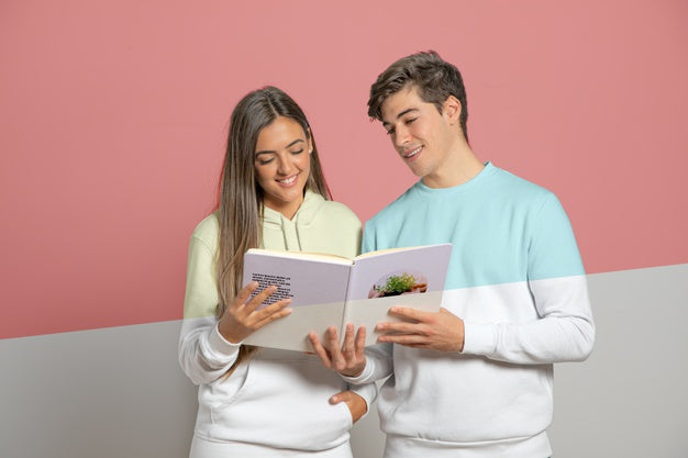 Front View Of Man And Woman Holding Book Psd