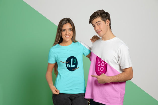 Front View Of Man And Woman Posing In T-Shirts And Pointing At Them Psd