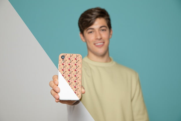 Front View Of Man Holding Smartphone Psd