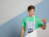 Front View Of Man In Apron Holding Wooden Spoon Psd